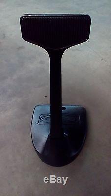 Antique Mercury outboard stand