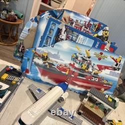 Huge LEGO vintage lot Firetrucks, Boats, Airplanes, Minifigures, Asst Parts