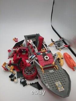 Lego lot of loose pieces includes boat parts and minifigures