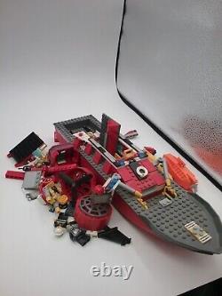 Lego lot of loose pieces includes boat parts and minifigures