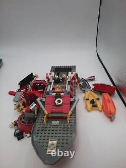 Lego lot of loose pieces includes boat parts and minifigures