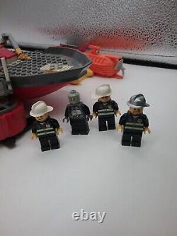 Lego lot of loose pieces includes boat parts and minifigures