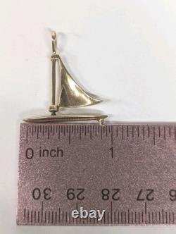 Vintage Douglas 14K Gold Nautical Sailboat Moving Sail Charm Pendant