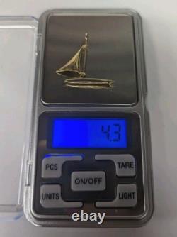 Vintage Douglas 14K Gold Nautical Sailboat Moving Sail Charm Pendant