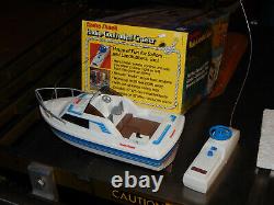 Vintage Radio Shack Radio Controlled Cruiser Boat WithBox + Extra Toy Parts Lot