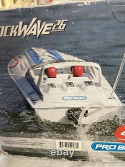 Vintage Shockwave 26 RC Boat in box Parts As Is Remote 2 Battery Packs & Manual