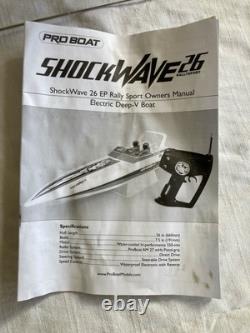 Vintage Shockwave 26 RC Boat in box Parts As Is Remote 2 Battery Packs & Manual