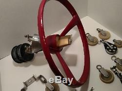 Vintage boat steering wheel with pulleys guides springs